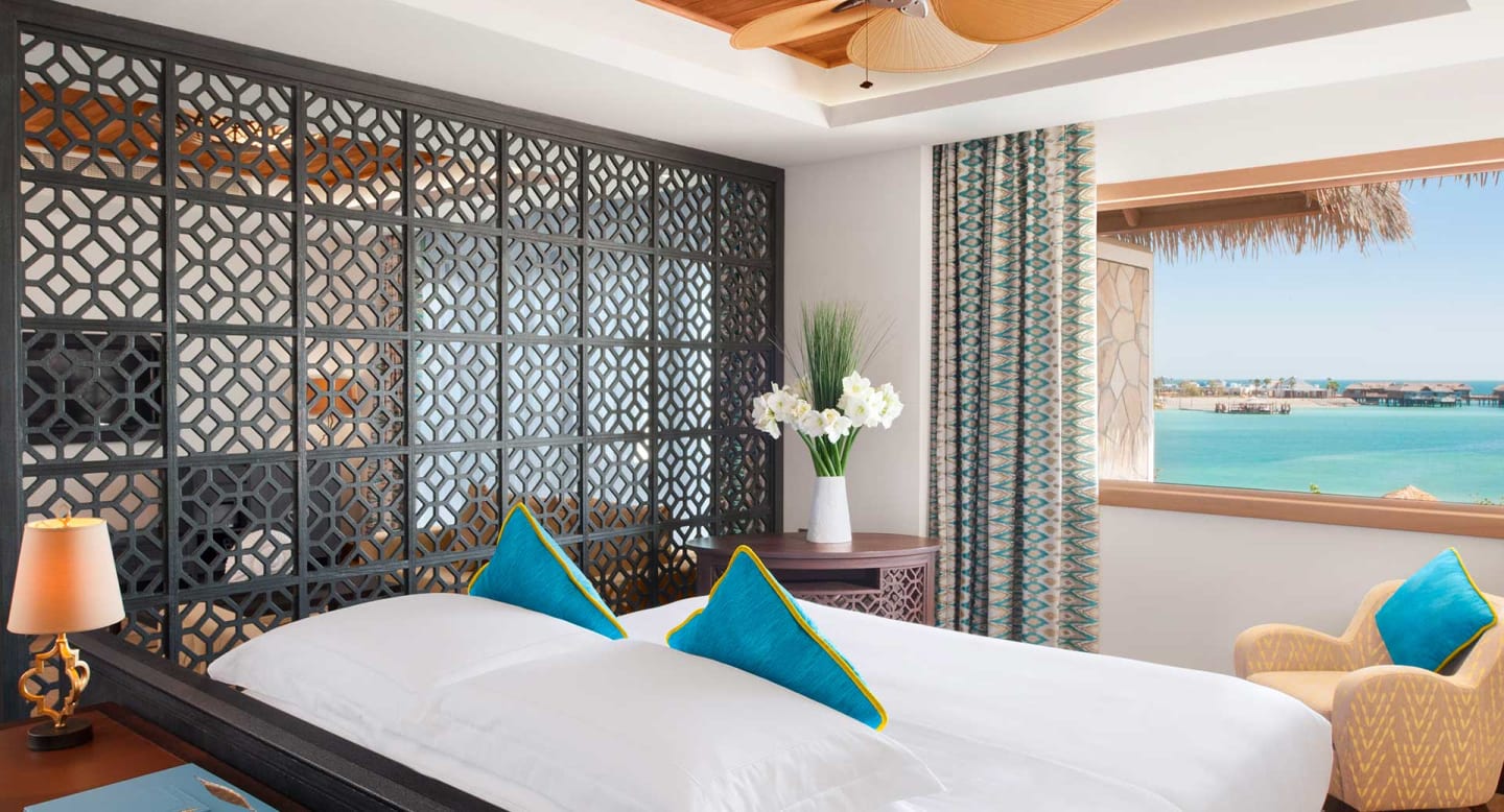 banana island doha anantara junior suite bedroom 1920x1037