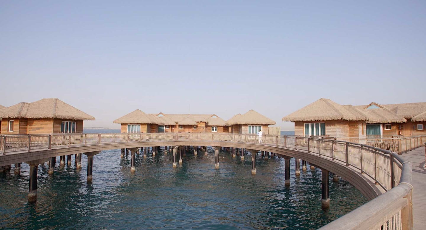 banana island doha anantara overwatervillas walkway 01 1920x1037l